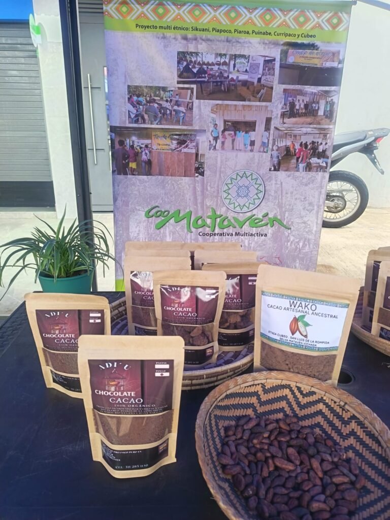 Coomatavén stand at the Economía para la Vida event in Inírida showcasing sustainable agroforestry cocoa